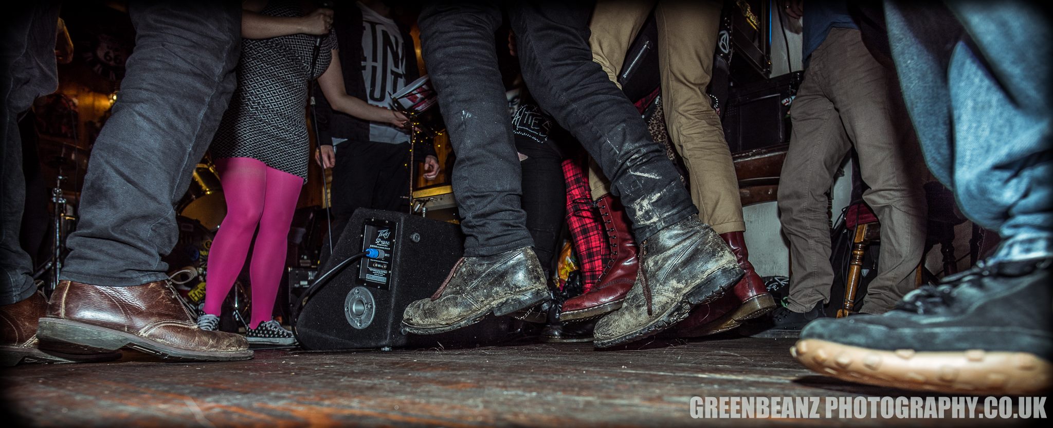 Floor shot of boots at a gig