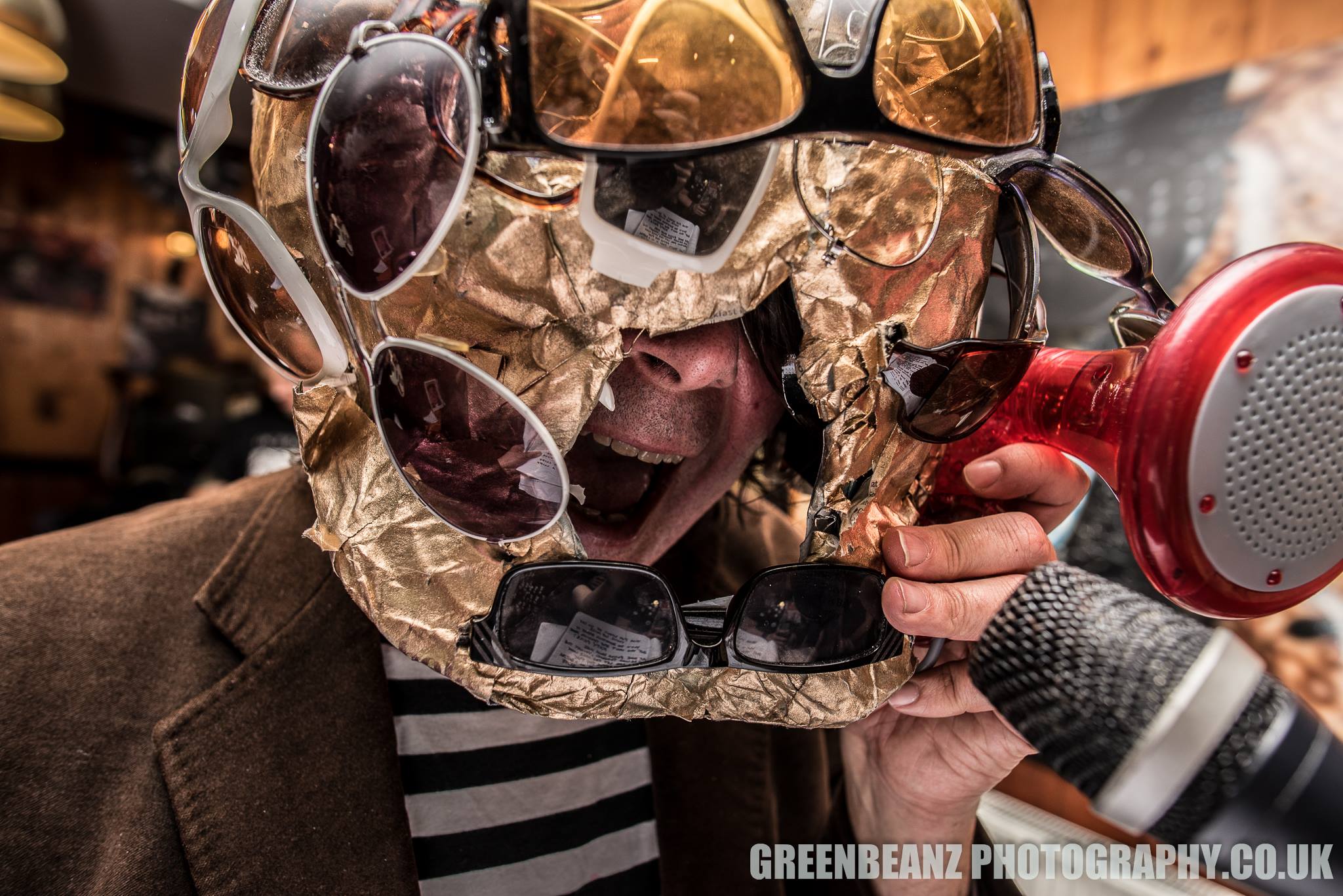 Mo Bottomley in Sunglasses Covered Gold Foil Space Helmet