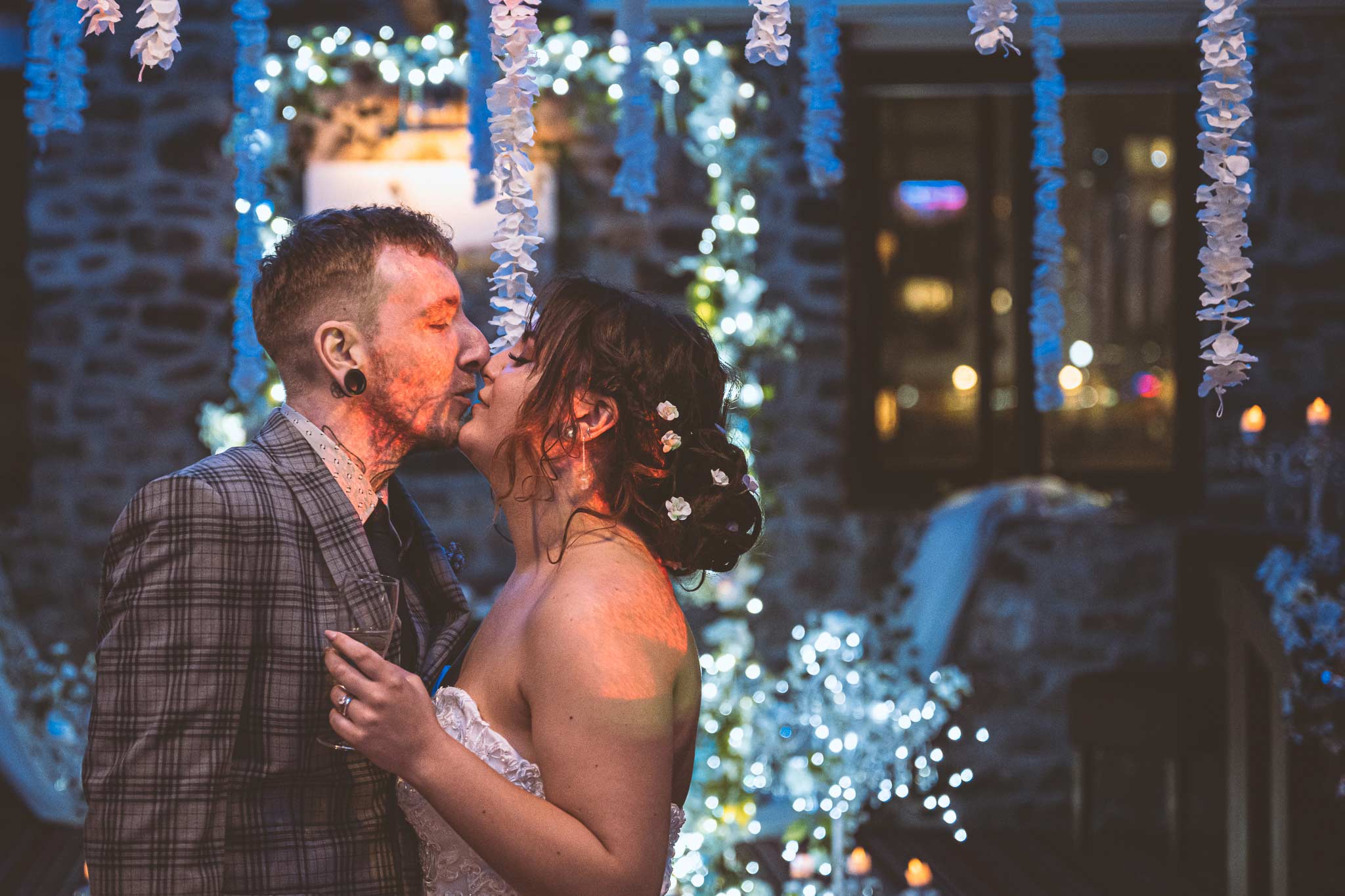 Jamie and Chris kiss at their wedding