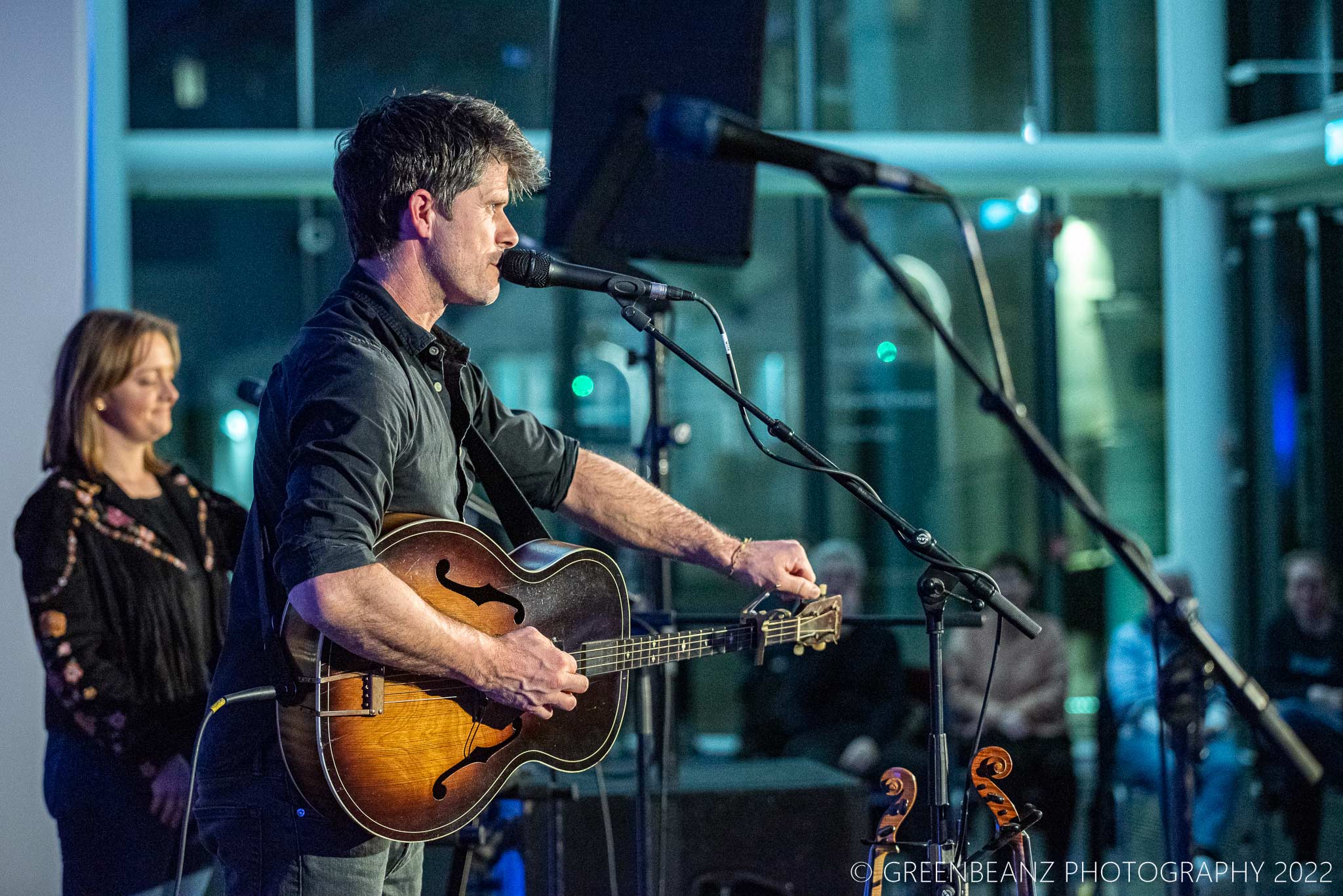 Seth Lakeman tuning his tenor guitar live at The Box in Plymouth 2022