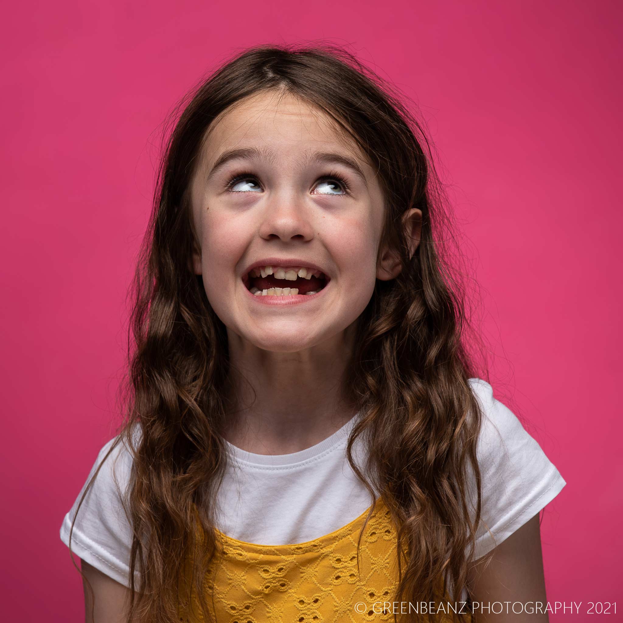 Plymouth Headshot of young girl actress with pink backdrop