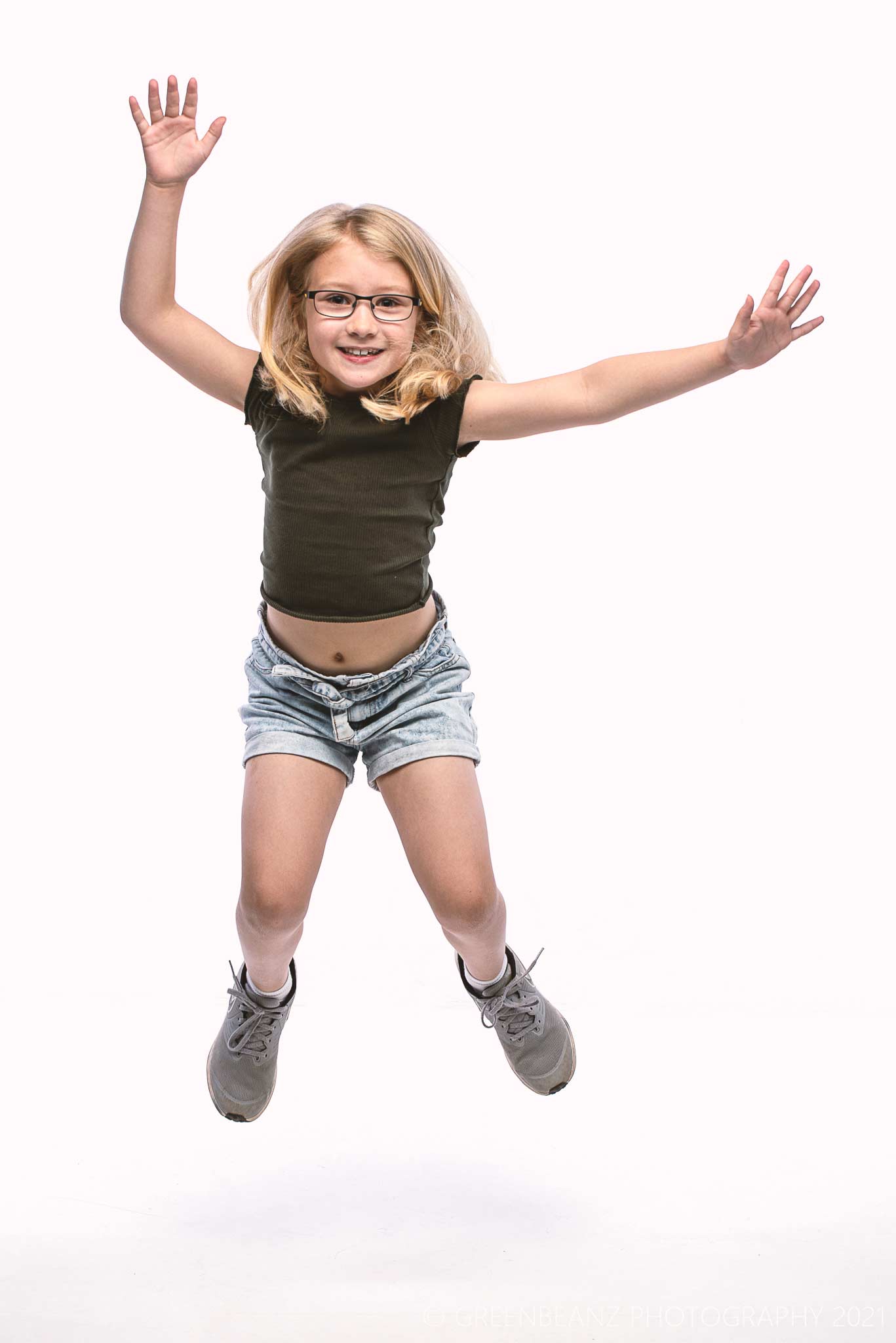Plymouth young actress Bonnie jumping in studio shoot