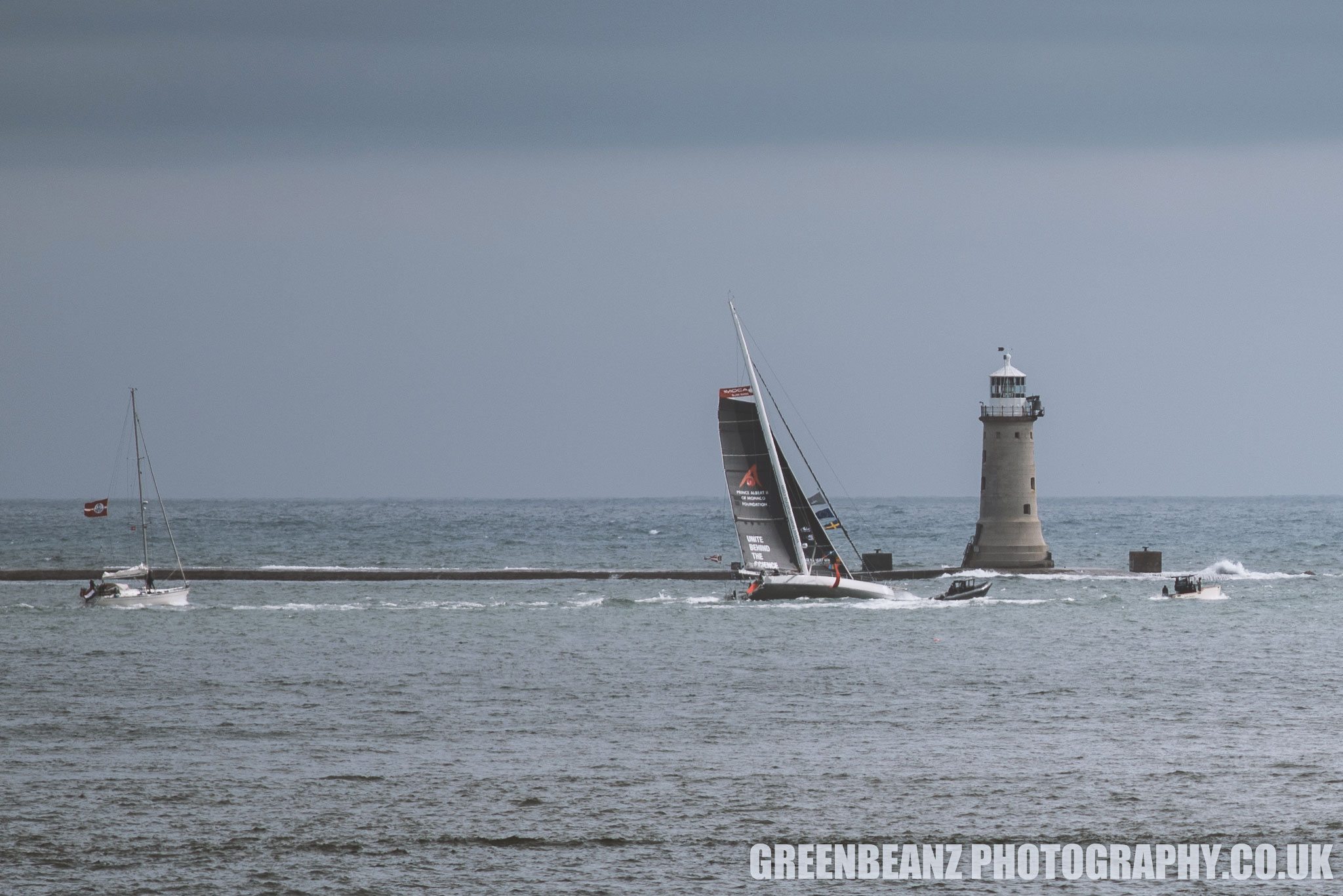 Malizia heading past Plymouth breakwater on its way to the Atlantic in 2019