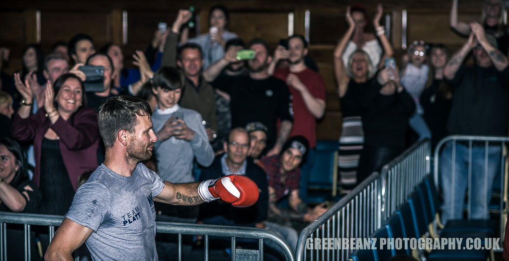 Boxer Jordan Platt approaching ring in Plymouth fans behind