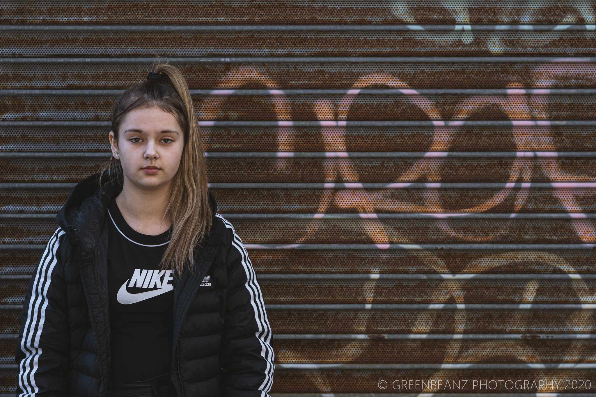 Poppy posing in sports casuals for candid portfolio shoot