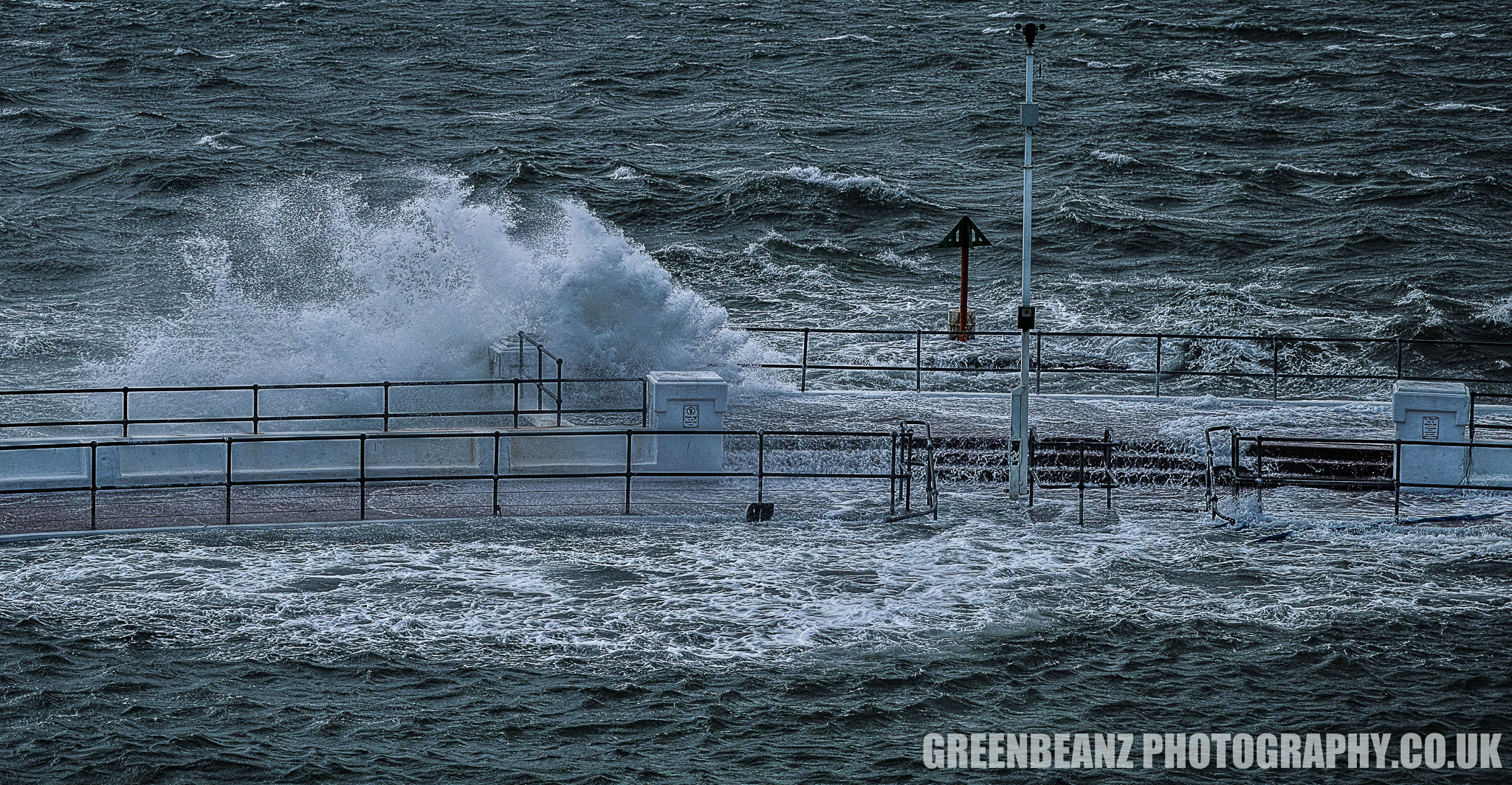 Plymouth Hoe. UK weather during storm Brian on the cities waterfront in 2017